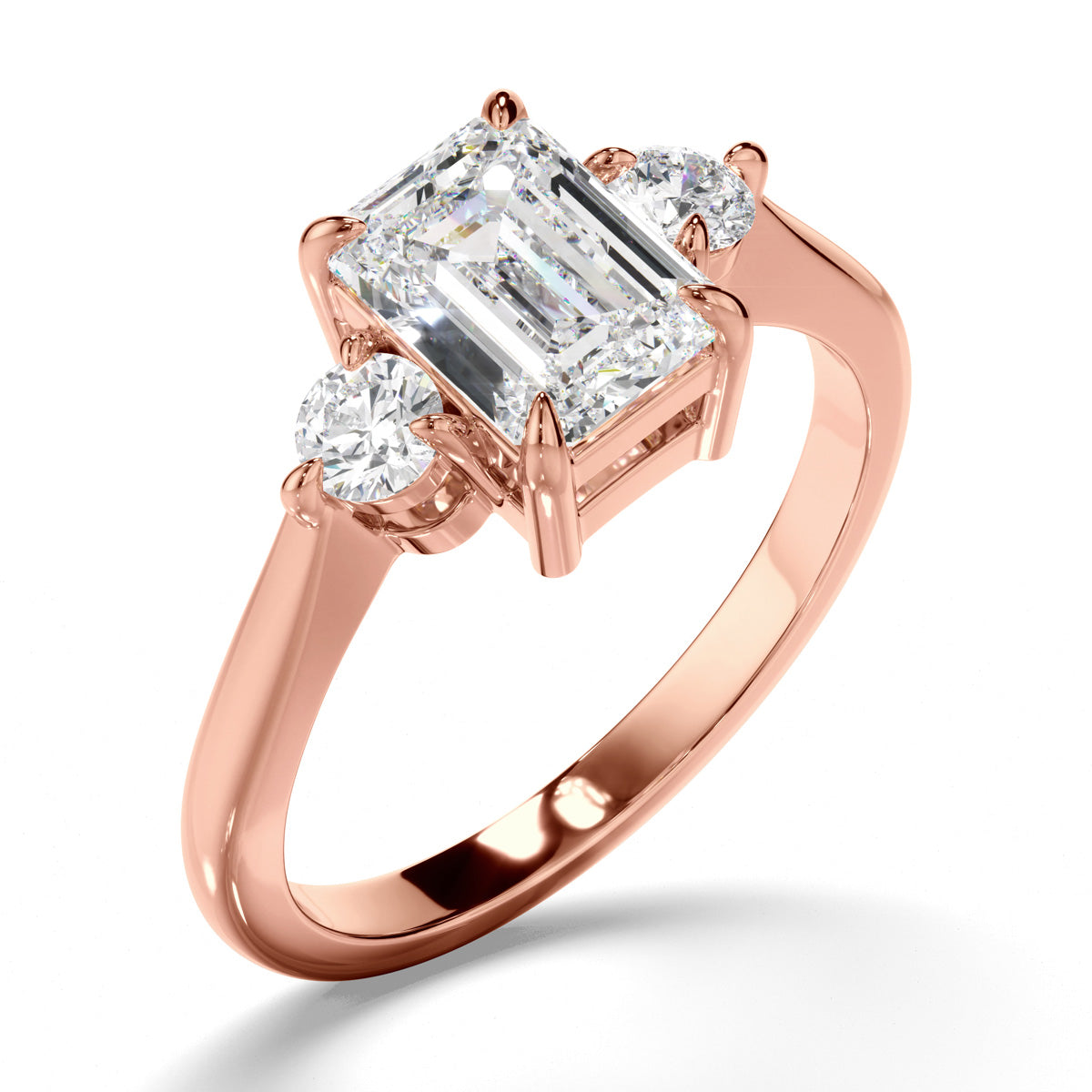 Emerald Cut Diamond Trilogy Engagement Ring with Round Brilliant Sides